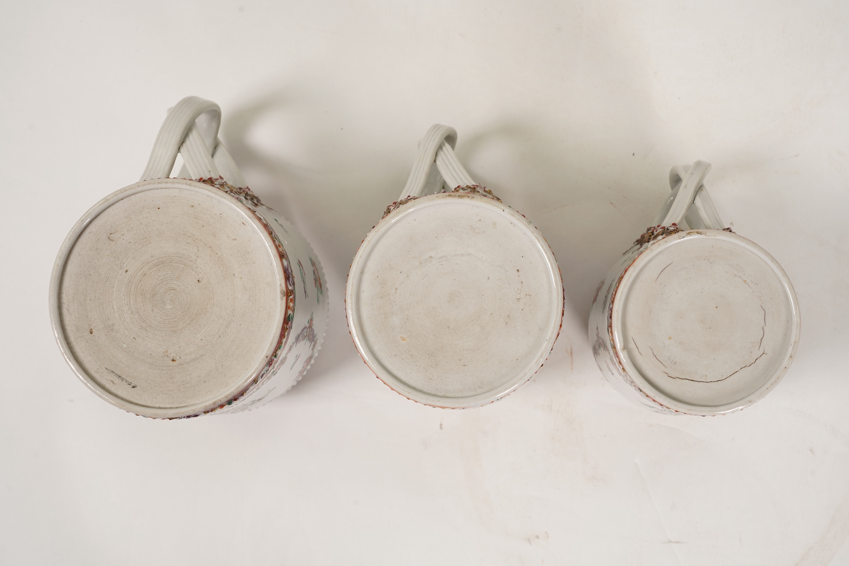 A graduated set of three Chinese export famille rose mugs, Qianlong period